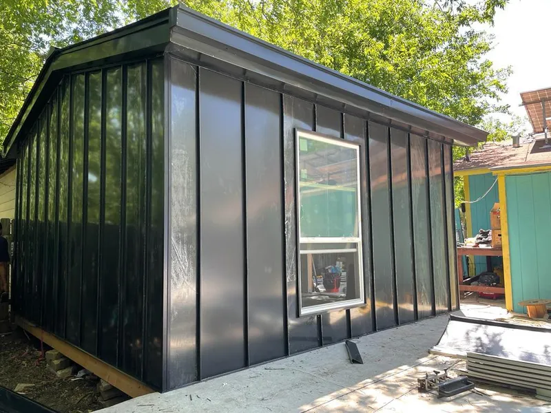 Black standing seam metal wall panels for Roof Inspection in Palm Springs North